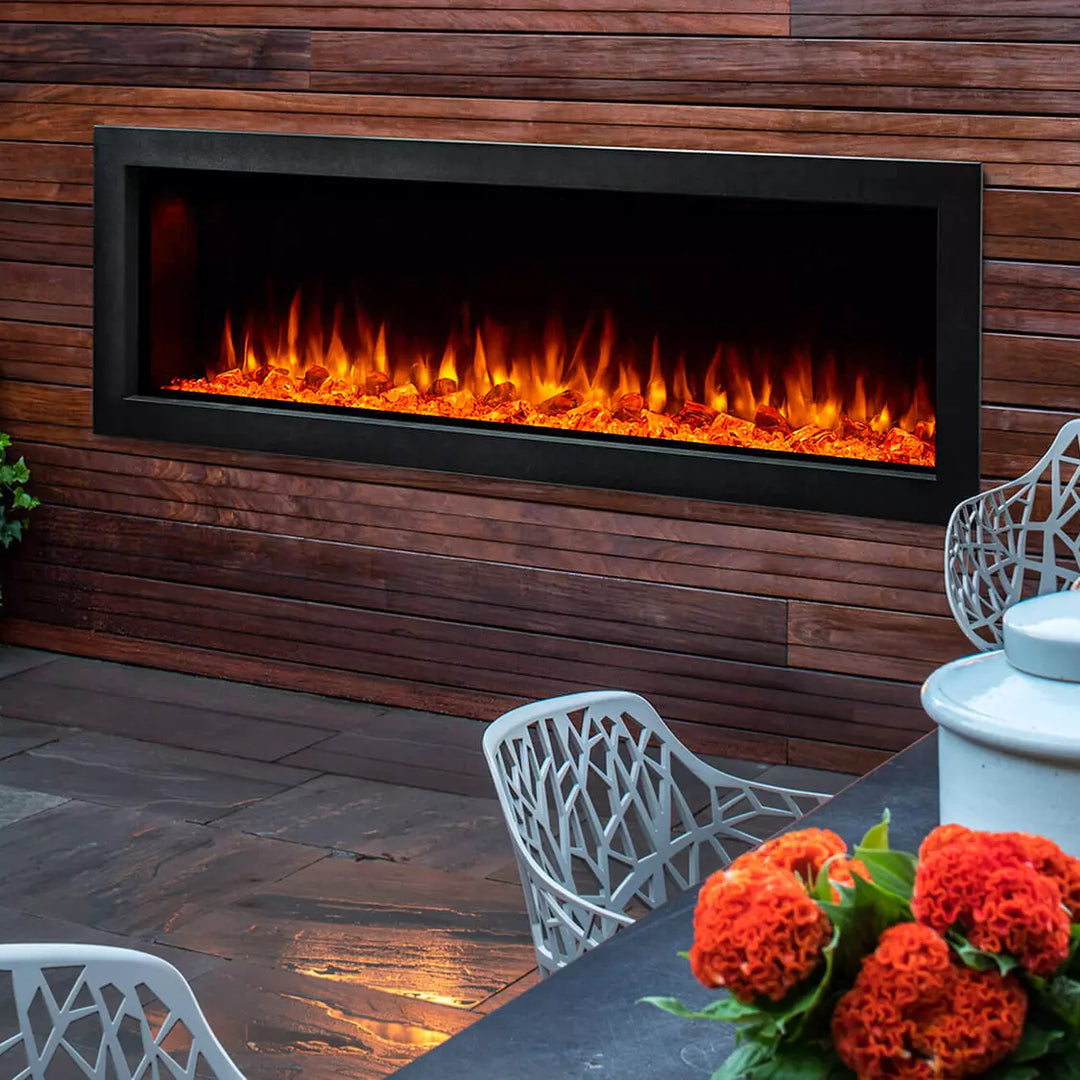 SimpliFire 55" Forum outdoor linear electric fireplace  - SF-OD55 with orange flames and in outdoor patio area