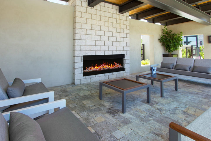 amantii 50-inch slim 3-sided electric fireplace installed in an outdoor covered patio setting
